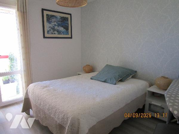 Proche centre ville : Bel appartement de type 4 situé au 1er étage,  avec garage , cave et balcons