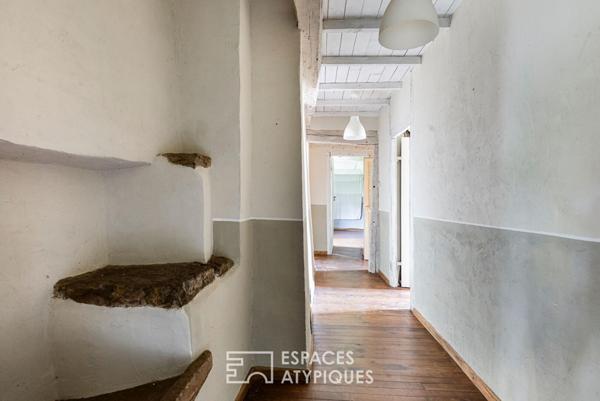 Maison au charme pittoresque et son jardin bucolique