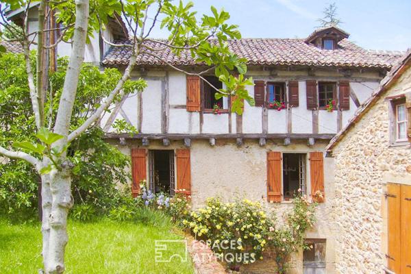 Maison au charme pittoresque et son jardin bucolique