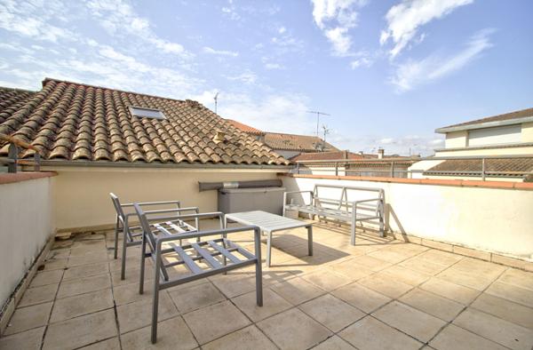 AGEN HYPER CENTRE - Appartement lumineux T3 de 70m² avec terrasses, parking et ascenseur dans une résidence sécurisée au sein d'un quartier recherché.