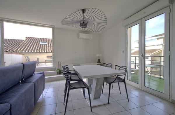 AGEN HYPER CENTRE - Appartement lumineux T3 de 70m² avec terrasses, parking et ascenseur dans une résidence sécurisée au sein d'un quartier recherché.