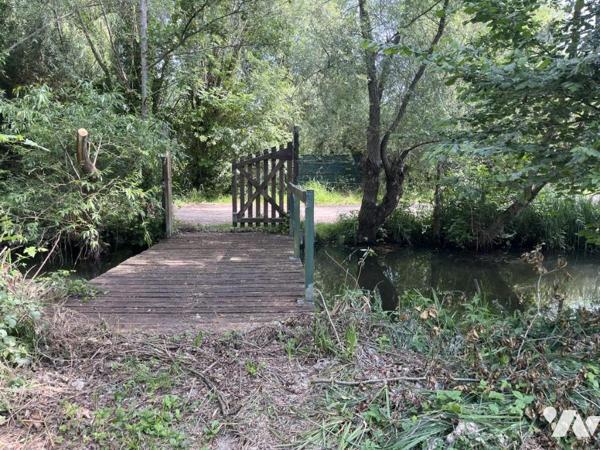 PARCELLE DE TERRAIN AVEC ETANG 
