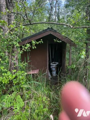 PARCELLE DE TERRAIN AVEC ETANG 