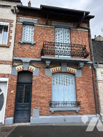 Maison bourgeoise avec jardin et garage en centre ville