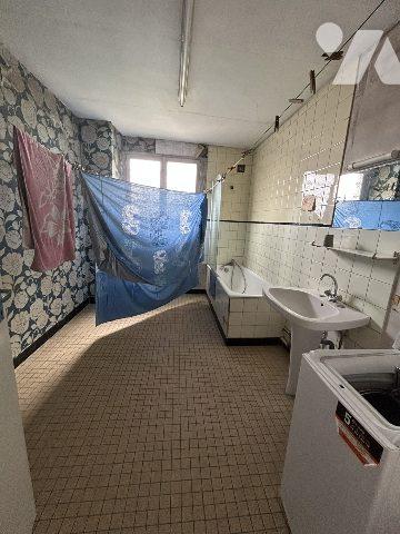 Maison bourgeoise avec jardin et garage en centre ville