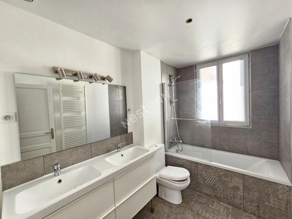 PUTEAUX CENTRE VILLE : DUPLEX de 90m² en Carrez et 120m² au sol avec 3 chambres et 2 caves