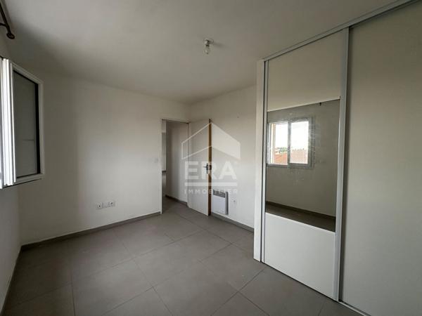 PIA : Immeuble comprenant 2 appartements type 3 avec extérieurs à vendre 