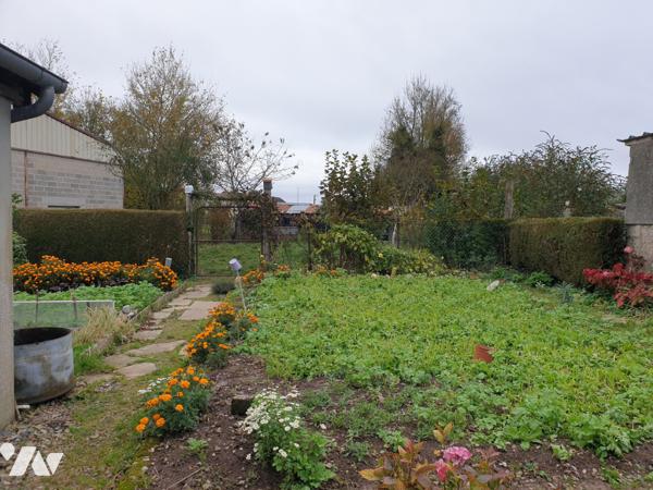 MAISON DE BOURG AVEC JARDIN