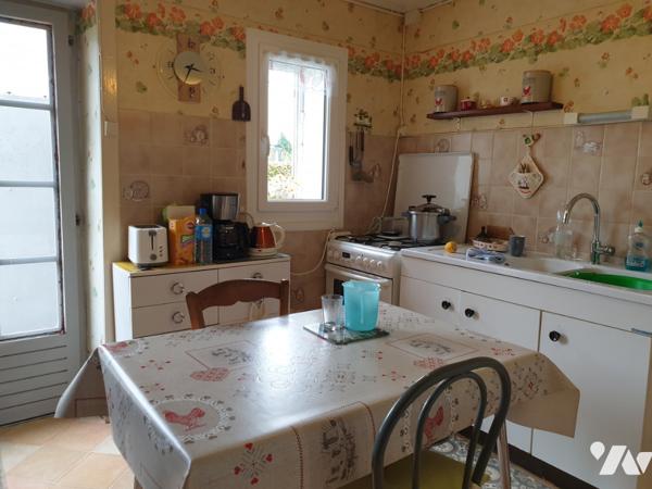 MAISON DE BOURG AVEC JARDIN