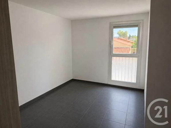Appartement F3 à vendre  3 pièces - 68,80 m 2   MARIGNANE  - 13
