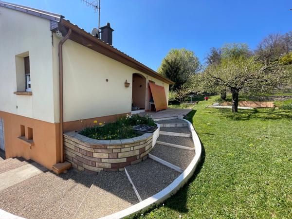Maison F5 sur sous sol avec garages, terrasse et terrain