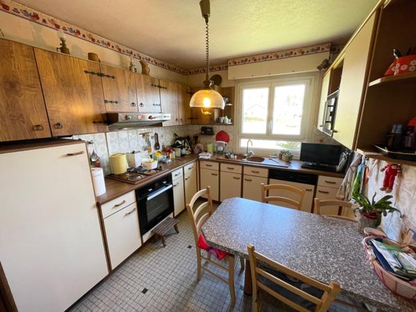 Maison F5 sur sous sol avec garages, terrasse et terrain