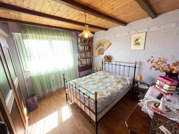 Maison F5 sur sous sol avec garages, terrasse et terrain