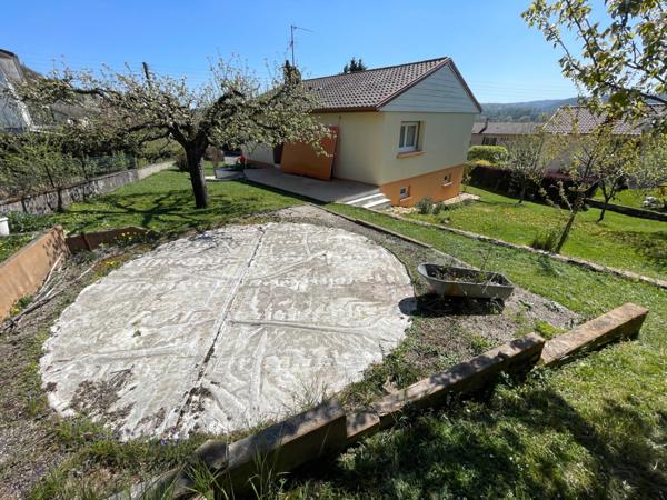 Maison F5 sur sous sol avec garages, terrasse et terrain