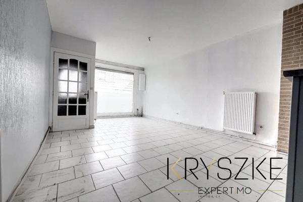 CARVIN – Maison divisée en 2 appartements – 94 m² – Garage et jardin