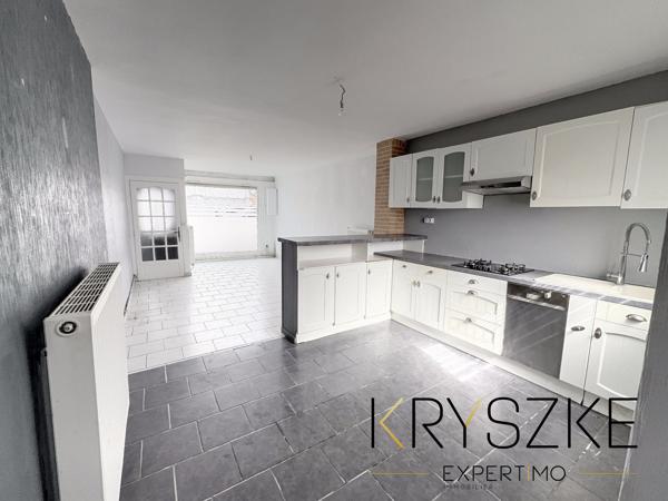 CARVIN – Maison divisée en 2 appartements – 94 m² – Garage et jardin