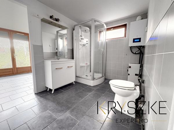 CARVIN – Maison divisée en 2 appartements – 94 m² – Garage et jardin
