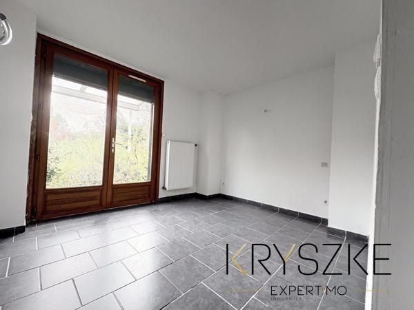 CARVIN – Maison divisée en 2 appartements – 94 m² – Garage et jardin