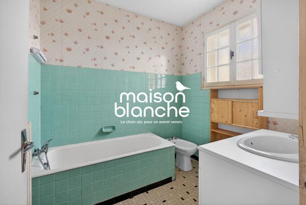 Maison de caractère des années 60 avec beau potentiel