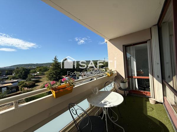 Appartement 65m² balcon, cave, et place de parking boxée