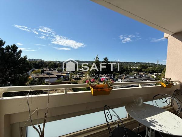 Appartement 65m² balcon, cave, et place de parking boxée