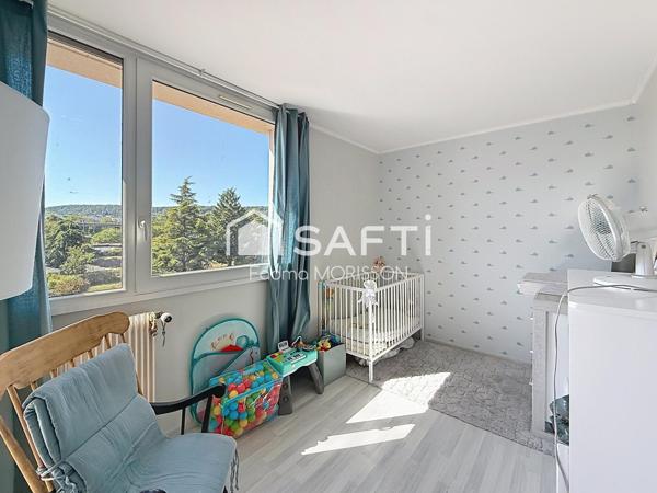 Appartement 65m² balcon, cave, et place de parking boxée