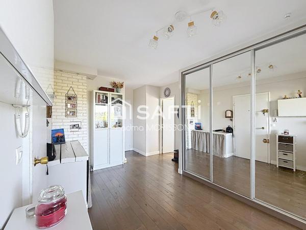 Appartement 65m² balcon, cave, et place de parking boxée