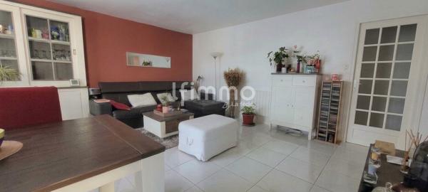 Appartement F3 avec terrasse, cave et parking privatif