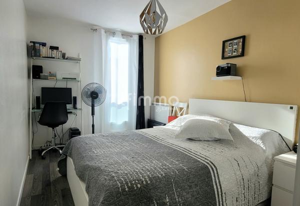 Appartement F3 avec terrasse, cave et parking privatif