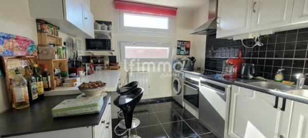 Appartement F3 avec terrasse, cave et parking privatif
