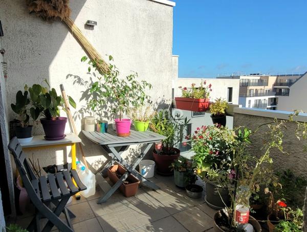 Appartement F3 avec terrasse, cave et parking privatif
