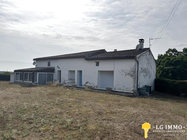 Maison de plain-pied au milieu de son jardin arboré d'arbres fruitiers avec grange de 346 m2