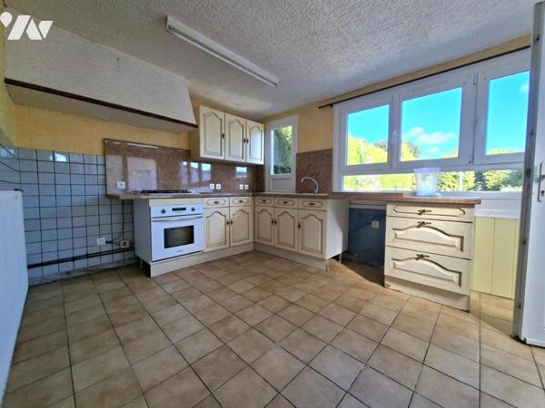 Maison semoi-mitoyenne, 3 chambres, jardin et garage