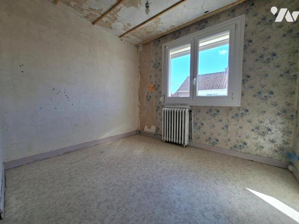 Maison semoi-mitoyenne, 3 chambres, jardin et garage