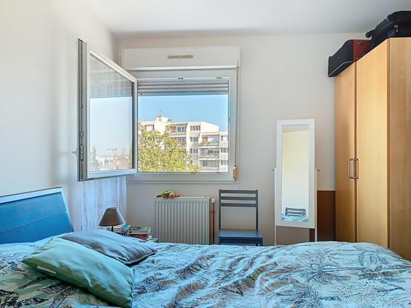 T4 Fontaine-Lès-Dijon - deux balcons - une place de parking