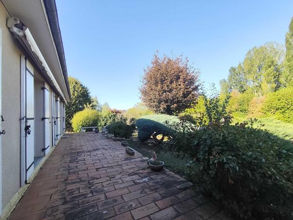 MAISON DE PLAIN PIED AVEC JARDIN