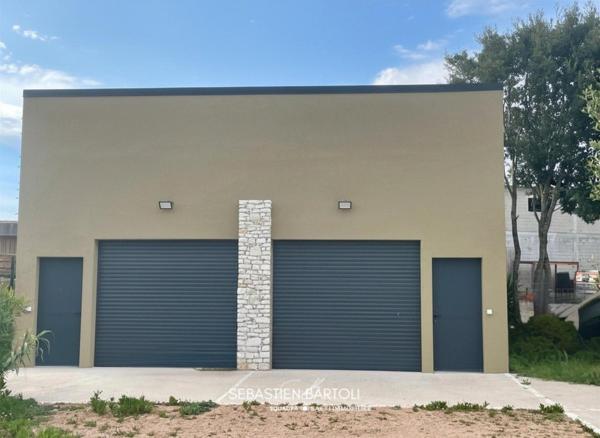 Immeuble avec local commercial et habitation principale