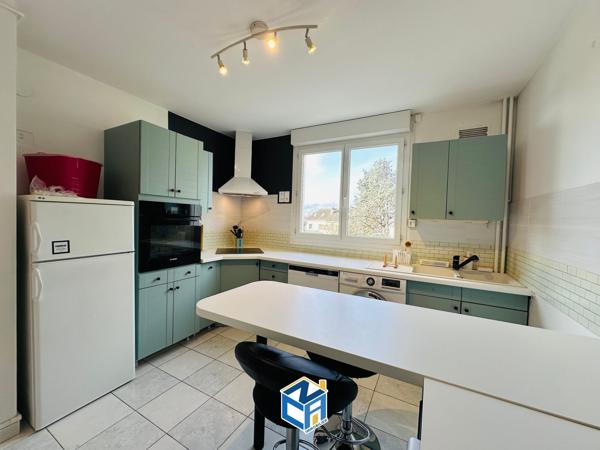 Appartement T3 avec balcon, cave et parking