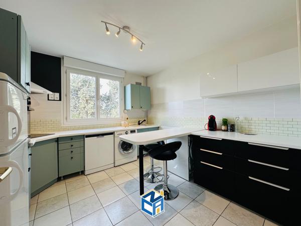 Appartement T3 avec balcon, cave et parking