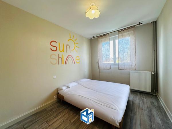 Appartement T3 avec balcon, cave et parking