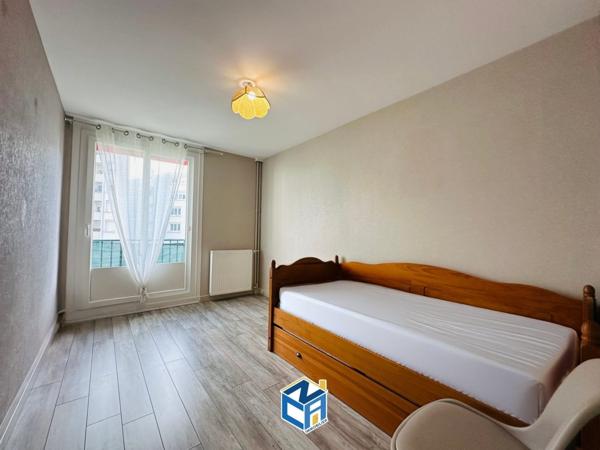 Appartement T3 avec balcon, cave et parking