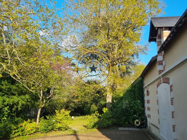 Demeure 19ème avec dépendance et son parc au coeur de Mûrs-Erigné