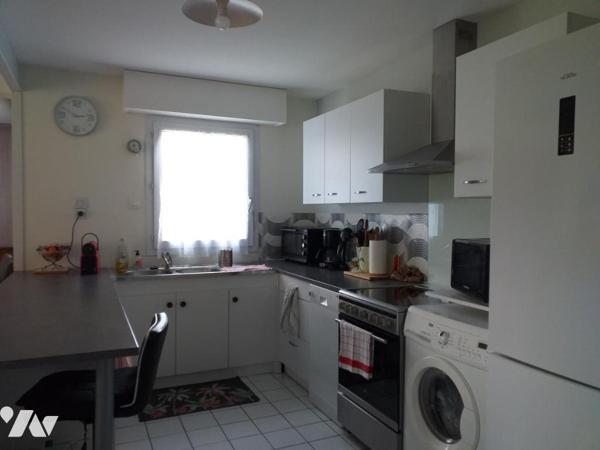 VIAGER OCCUPE T3 bis de 74m² en rdc avec jardinet et  parking