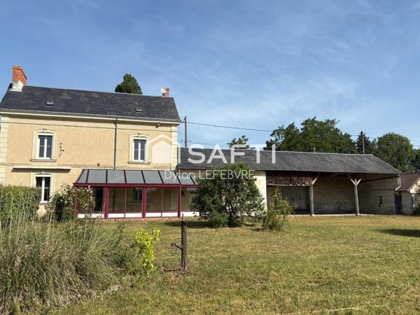 Maison avec dépendances et beau potentiel