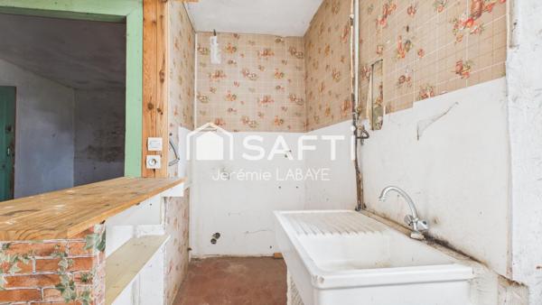 Maison à rénover avec terrain et dépendance