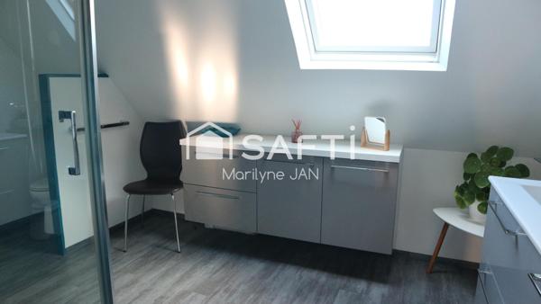 Dans un quartier calme, proche des commerces.