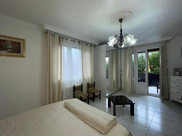 Maison familiale 9 pièces avec jardin - Charme et volumes à Bondy