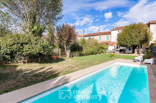Maison de ville avec jardin, piscine et garage