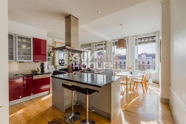 Appartement idéalement placé sur le boulevard - vue dégagée - ascenseur-cave -grenier-