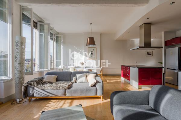 Appartement idéalement placé sur le boulevard - vue dégagée - ascenseur-cave -grenier-